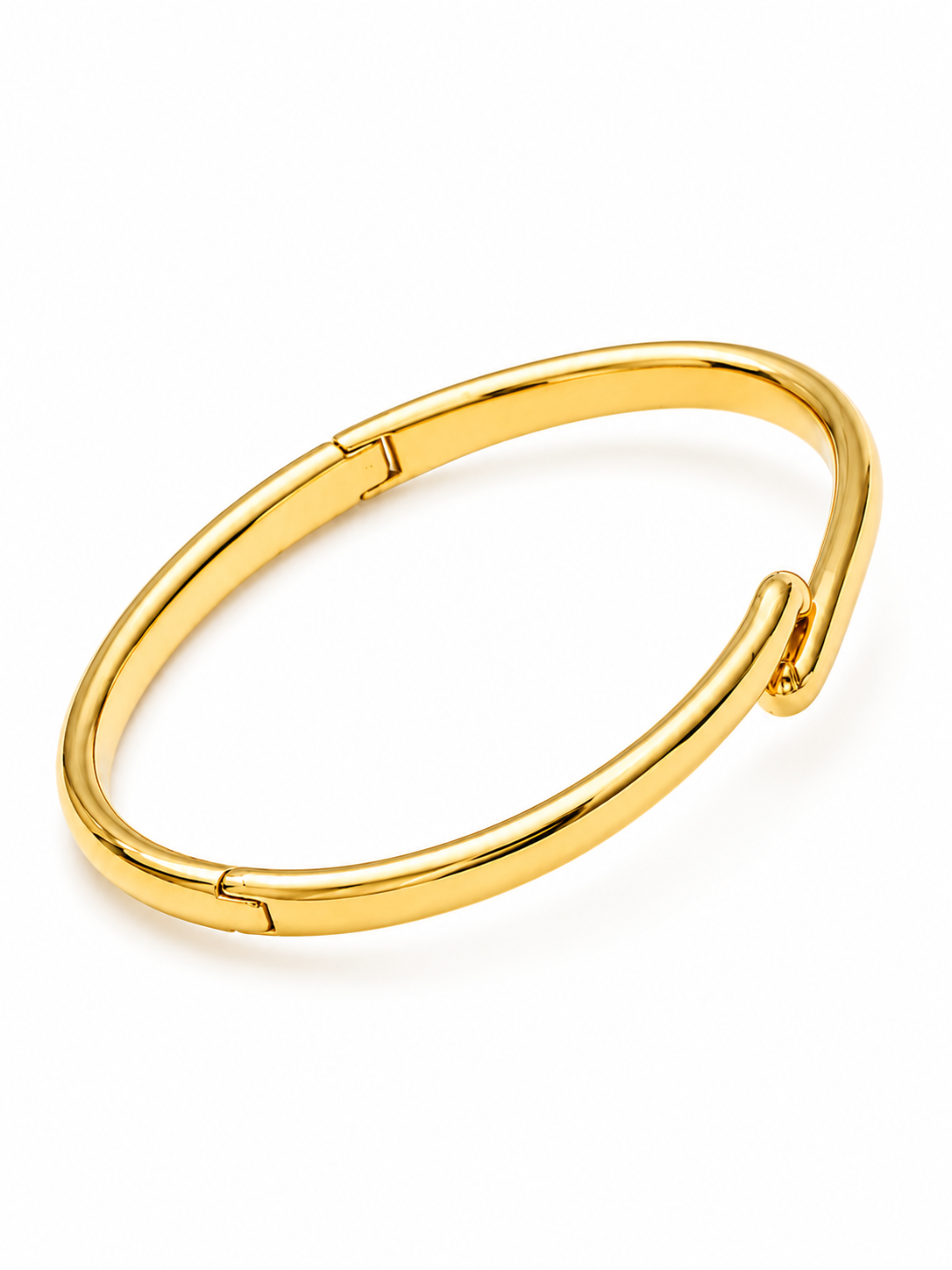 A polished gold-toned metal hinged cuff bracelet, shown on a clean white background.