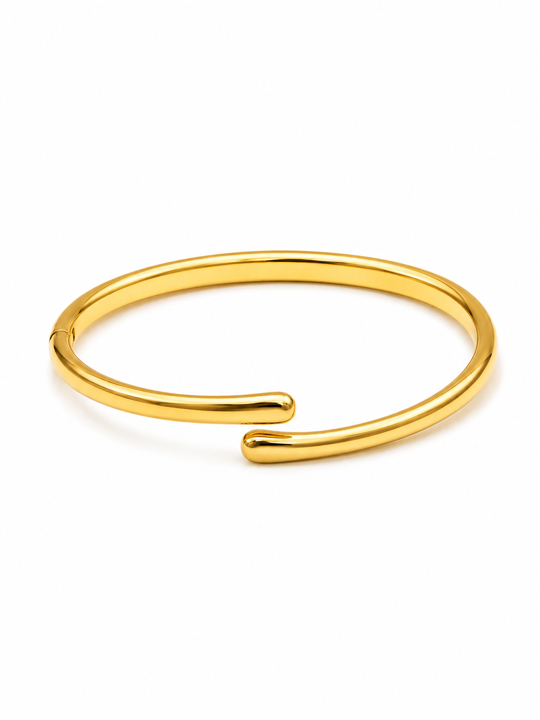 A polished gold open cuff bangle bracelet on a clean white background.