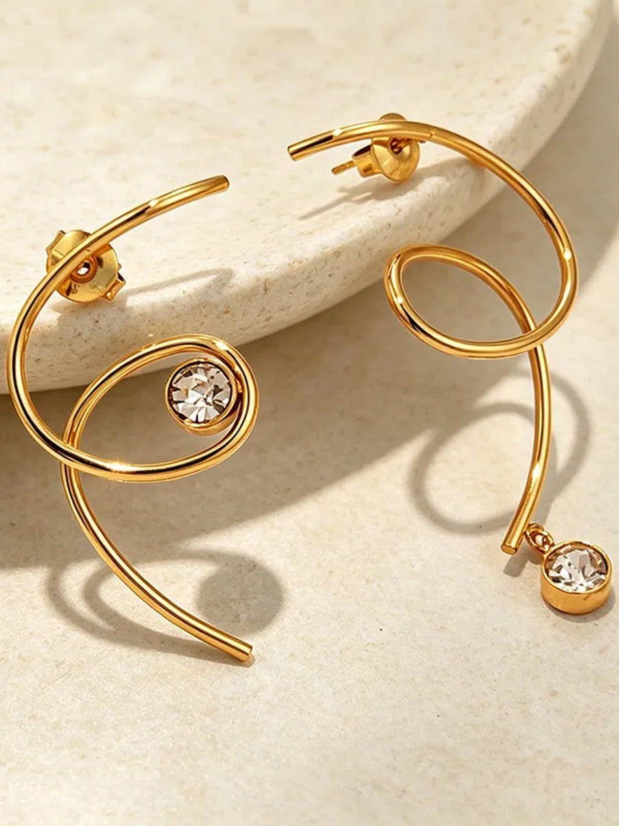 Swirl Solitaire Drop Earrings – flat lay – Pabeena