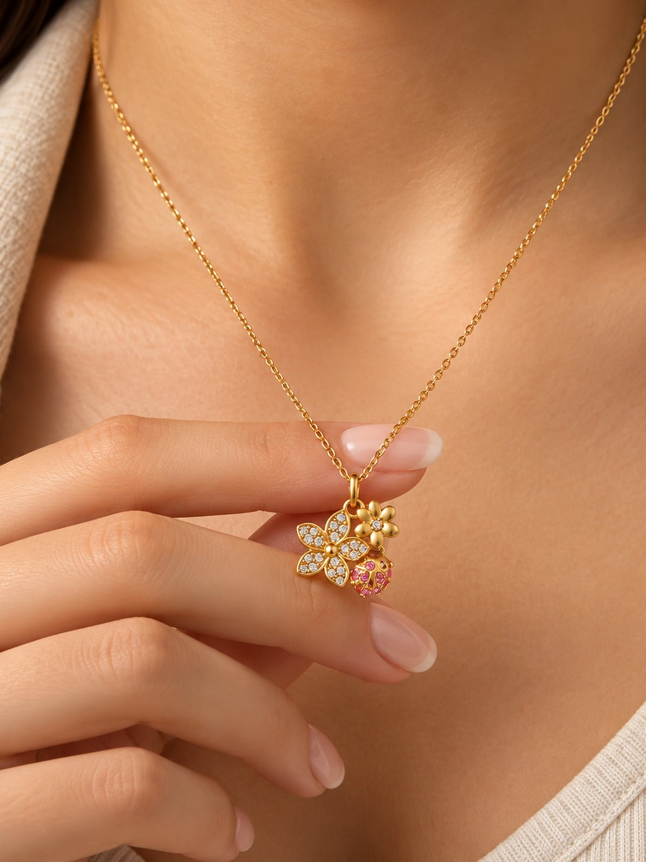 Ladybug Garden Necklace – pendant close-up in hand – Pabeena