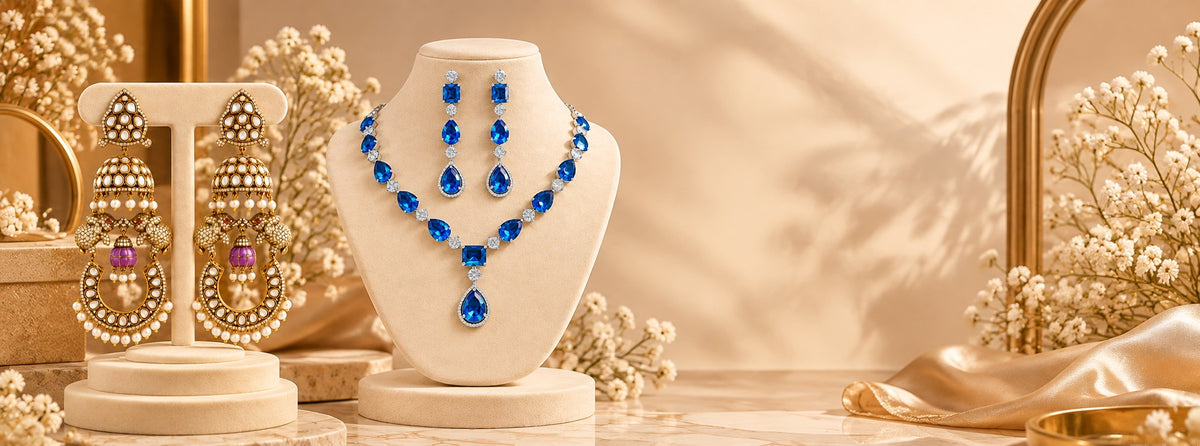 Pabeena blue stone necklace and earring set with kundan and pearl chandbali earrings