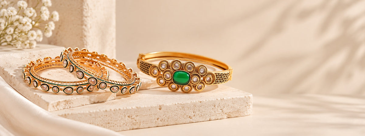 Pabeena kundan and green meenakari bangles with an antique gold kada
