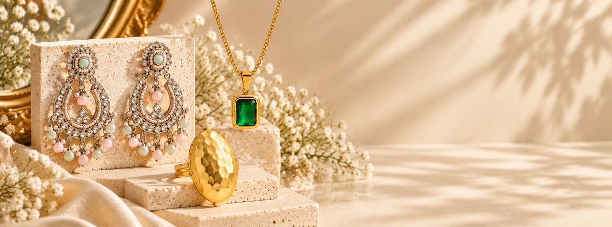 Pabeena pastel bead chandbali earrings, a green stone pendant on a gold chain and a hammered dome ring