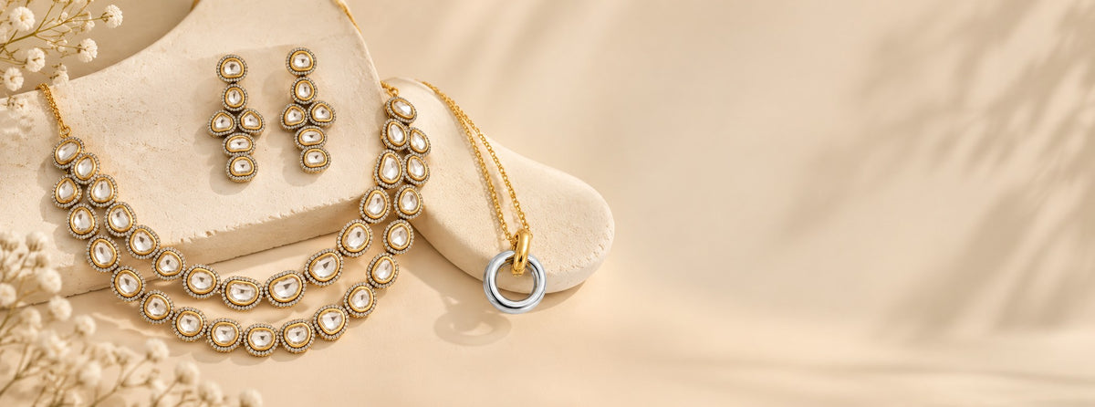 Pabeena two-layer kundan necklace with matching drop earrings and a gold-plated circle pendant